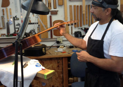 Robert Vincent handcrafting a classical guitar in his San Diego workshop